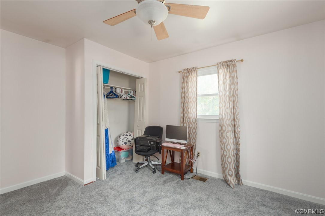122 Fairview Road Louisa, VA 23093 - Photo 27 of 39 a view of a workspace with furniture and a window