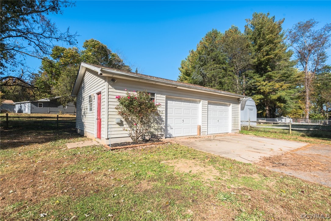 122 Fairview Road Louisa, VA 23093 - Photo 30 of 39 a view of a house with a yard and garage