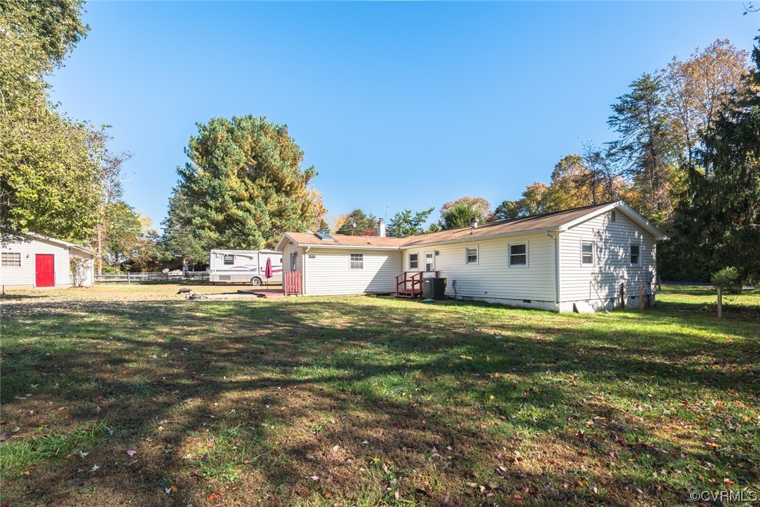 122 Fairview Road Louisa, VA 23093 - Photo 31 of 39 a view of a big yard with a house and garden