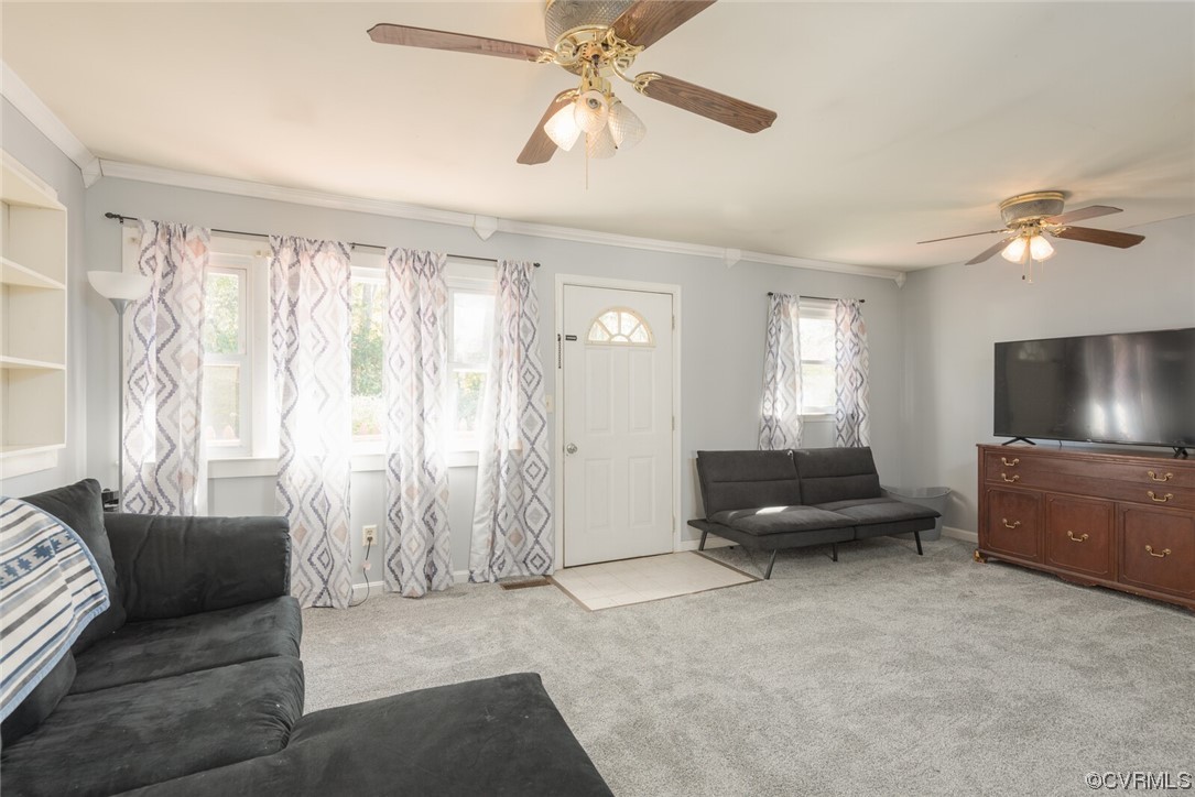 122 Fairview Road Louisa, VA 23093 - Photo 10 of 39 a living room with furniture and a flat screen tv