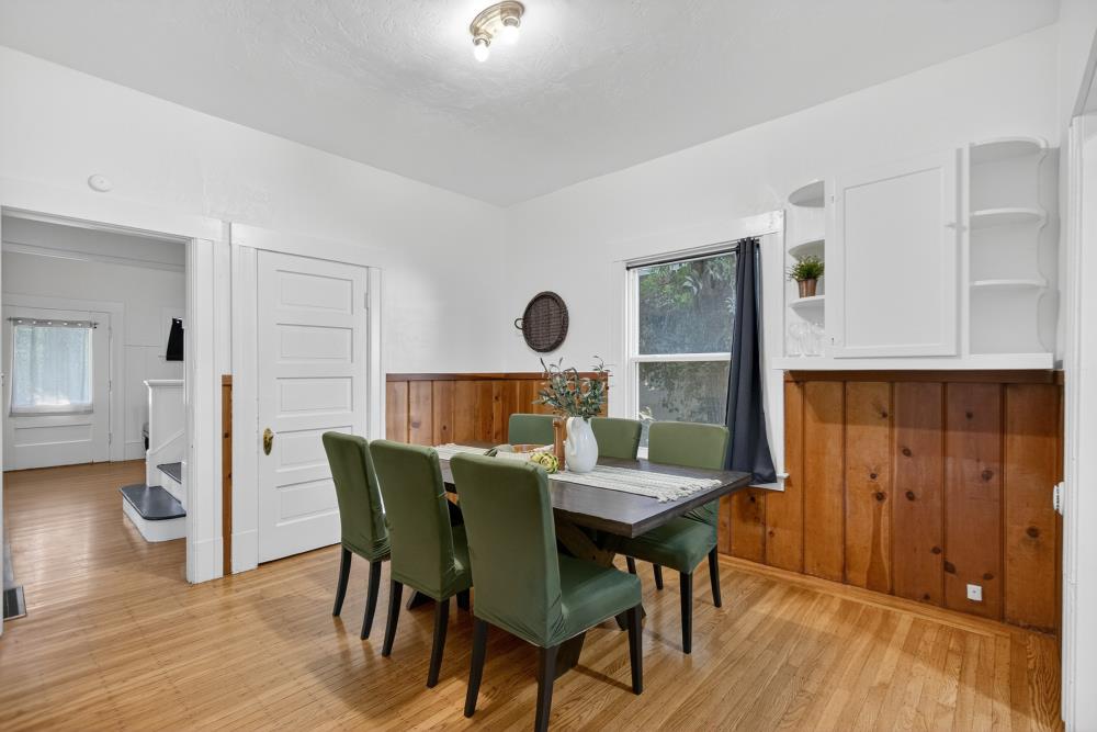 811 18th Street Sacramento, CA 95811 - Photo 13 of 71 a view of a dining room with furniture and wooden floor