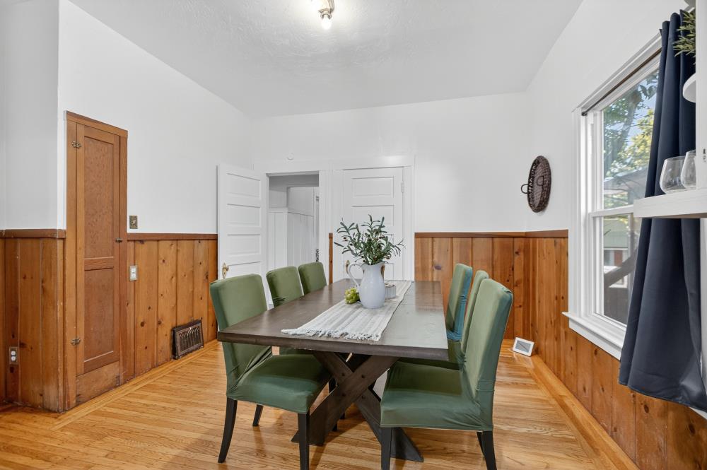 811 18th Street Sacramento, CA 95811 - Photo 14 of 71 a view of a dining room with furniture and wooden floor