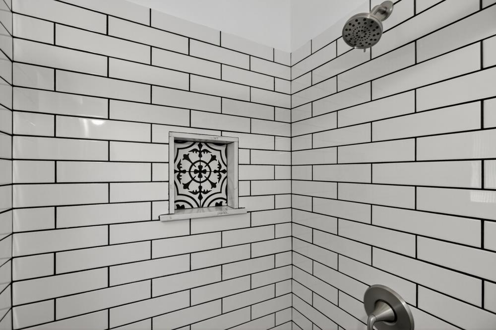 811 18th Street Sacramento, CA 95811 - Photo 20 of 71 a bathroom with a shower