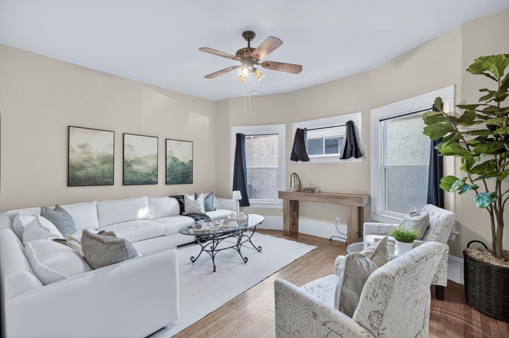 811 18th Street Sacramento, CA 95811 - Photo 22 of 71 a living room with furniture and a large window