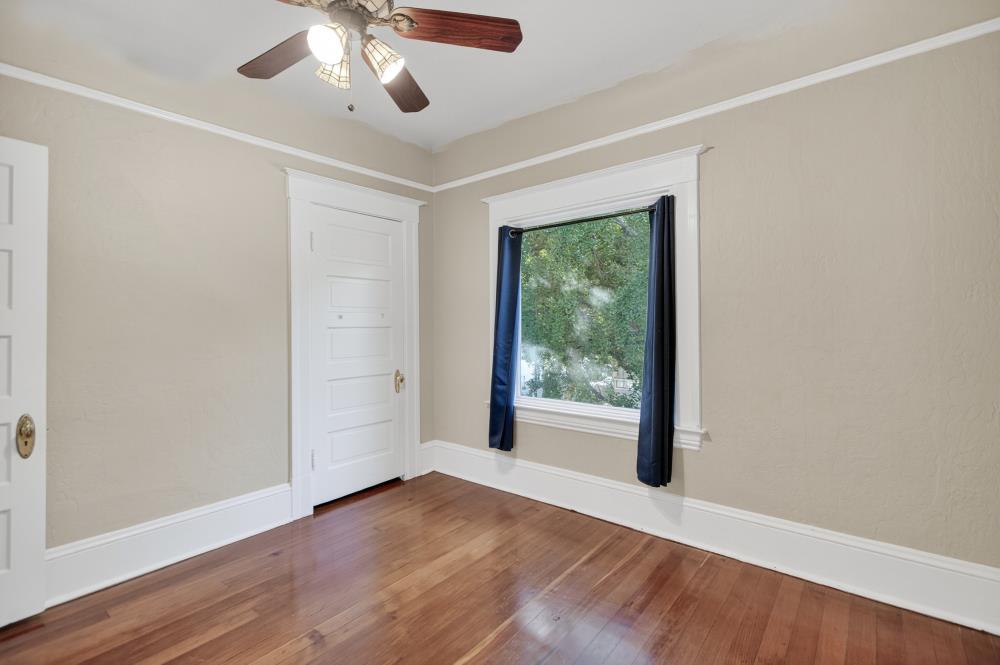 811 18th Street Sacramento, CA 95811 - Photo 30 of 71 wooden floor in an empty room with a window
