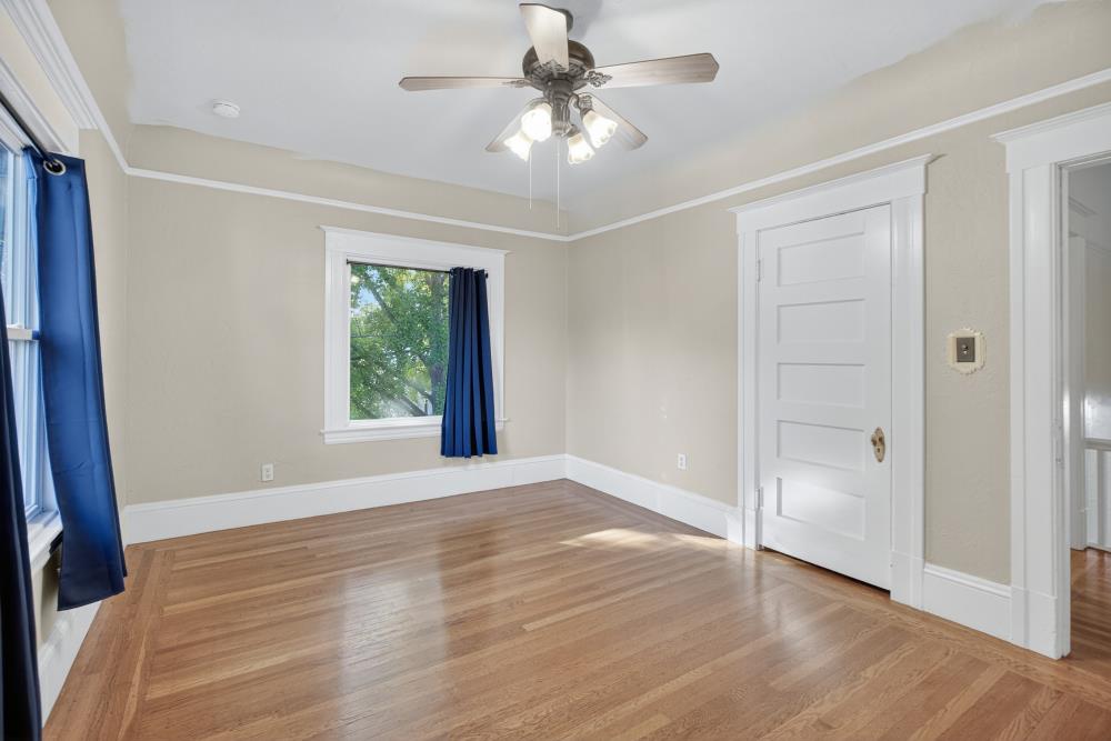 811 18th Street Sacramento, CA 95811 - Photo 32 of 71 wooden floor in an empty room with a window