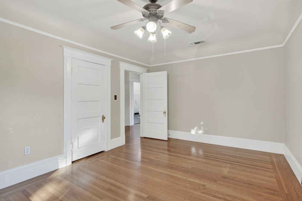 811 18th Street Sacramento, CA 95811 - Photo 33 of 71 wooden floor in an empty room with a window