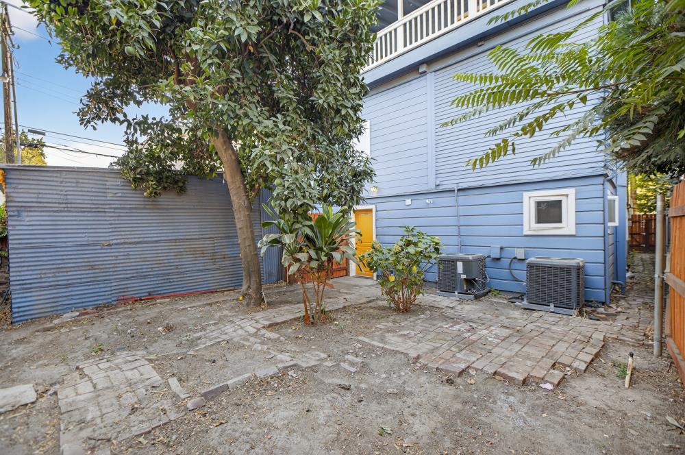 811 18th Street Sacramento, CA 95811 - Photo 43 of 71 a view of a house with a yard and sitting area