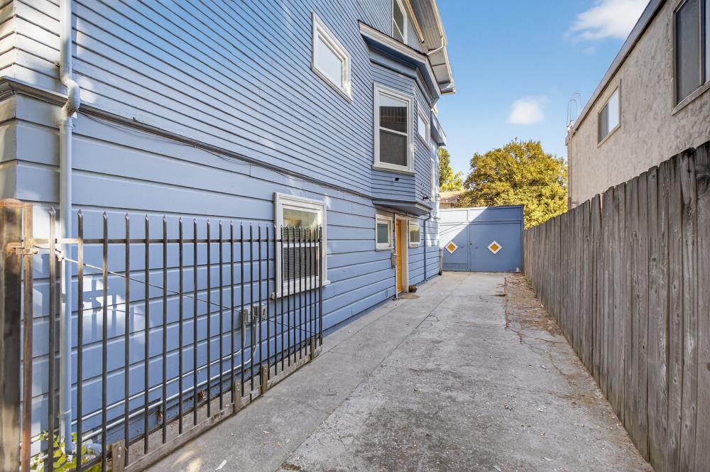 811 18th Street Sacramento, CA 95811 - Photo 46 of 71 a view of a house with a wooden fence