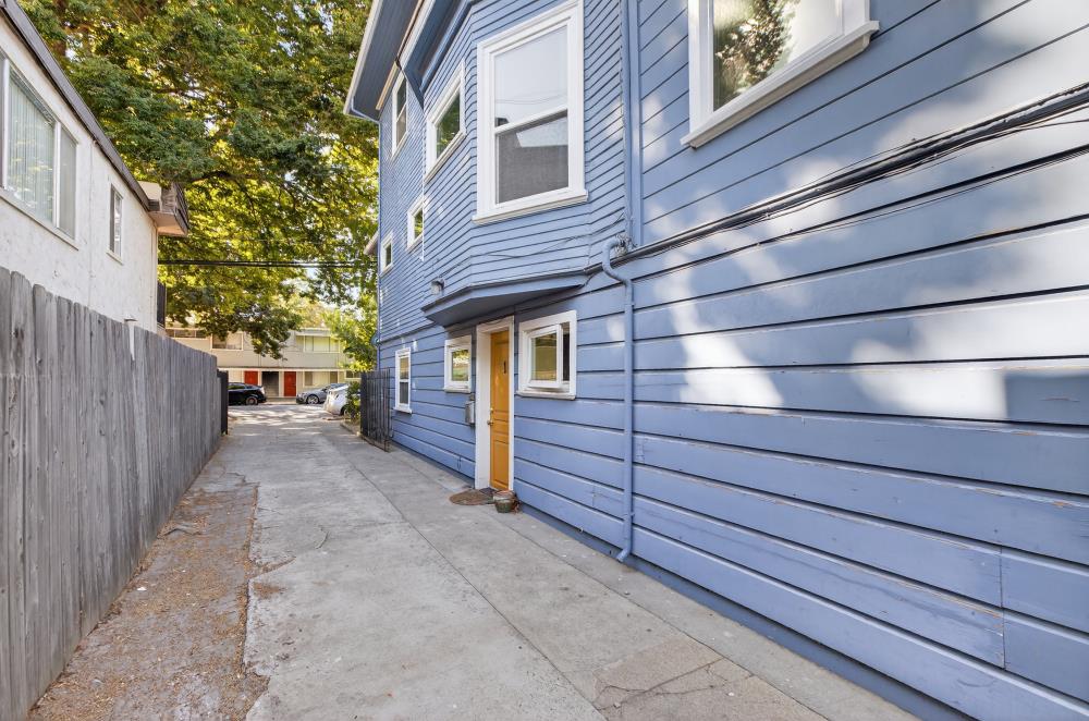 811 18th Street Sacramento, CA 95811 - Photo 49 of 71 a view of a house with a wooden fence