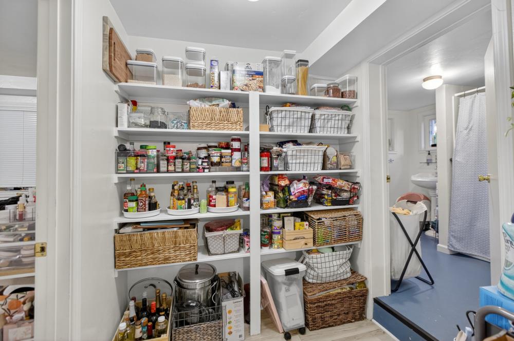 811 18th Street Sacramento, CA 95811 - Photo 58 of 71 a room with furniture and a book shelf