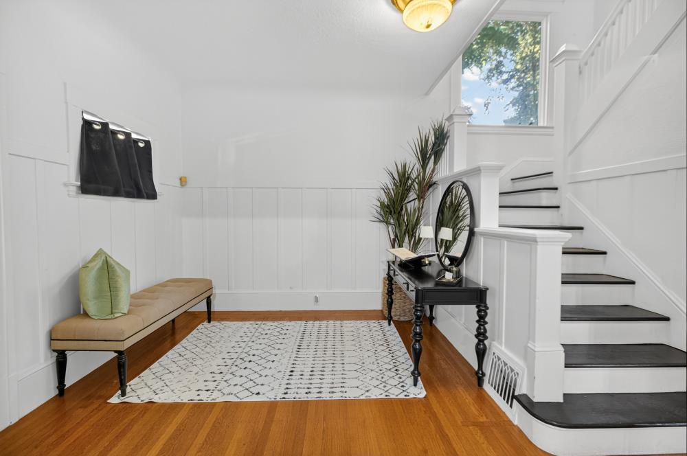 811 18th Street Sacramento, CA 95811 - Photo 7 of 71 a living room with furniture and a rug