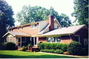 2625 Walker Road Matthews, NC 28105 - Photo 2 of 8 a front view of a house with garden