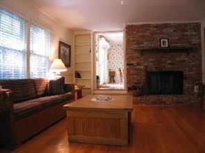 2625 Walker Road Matthews, NC 28105 - Photo 4 of 8 a living room with furniture and a fireplace