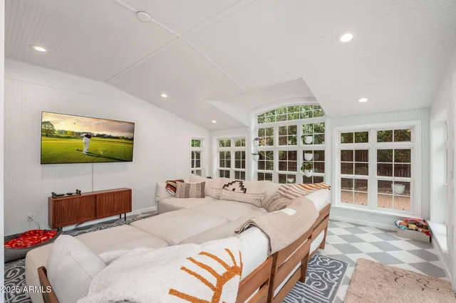 a kitchen with stainless steel appliances granite countertop a sink and cabinets
