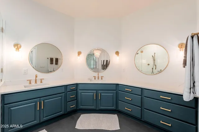 a view of a storage and utility room with washer and dryer