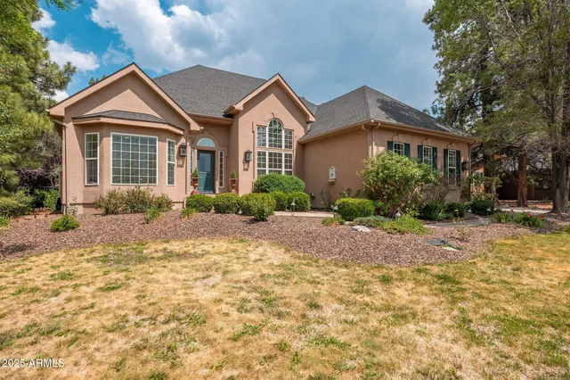 a front view of a house with a porch