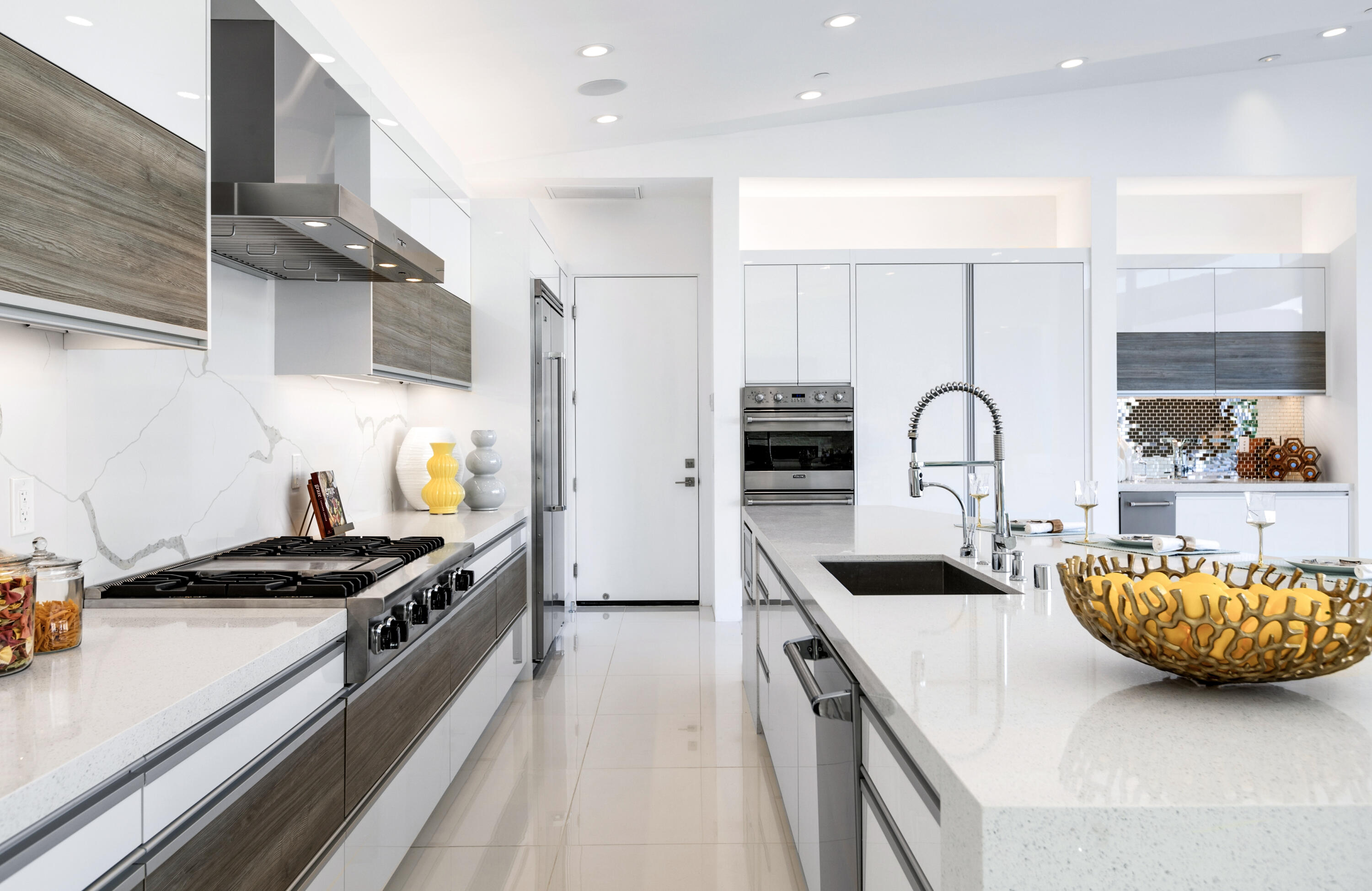 2696 Anza Trail Palm Springs, CA 92264 - Photo 11 of 99 a kitchen with granite countertop a stove and a sink