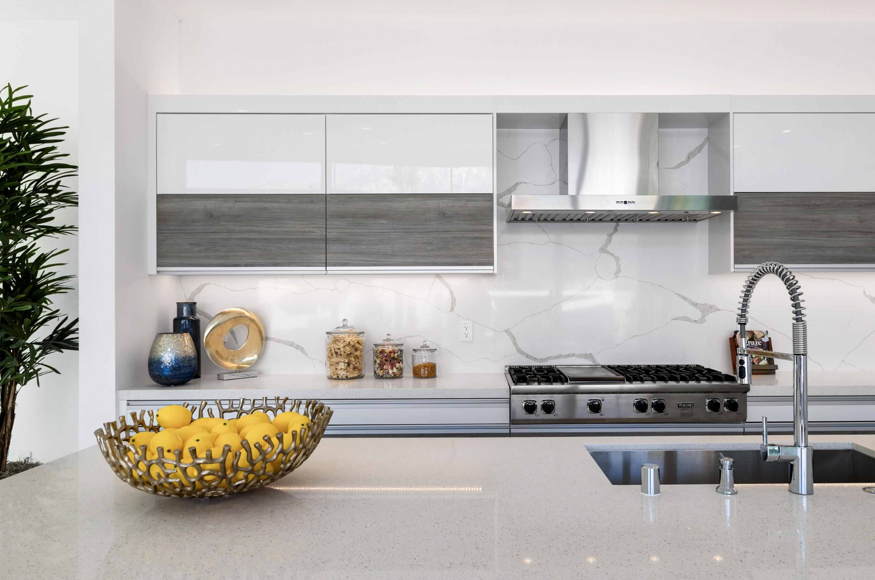 2696 Anza Trail Palm Springs, CA 92264 - Photo 14 of 99 a kitchen with a stove and a white cabinets