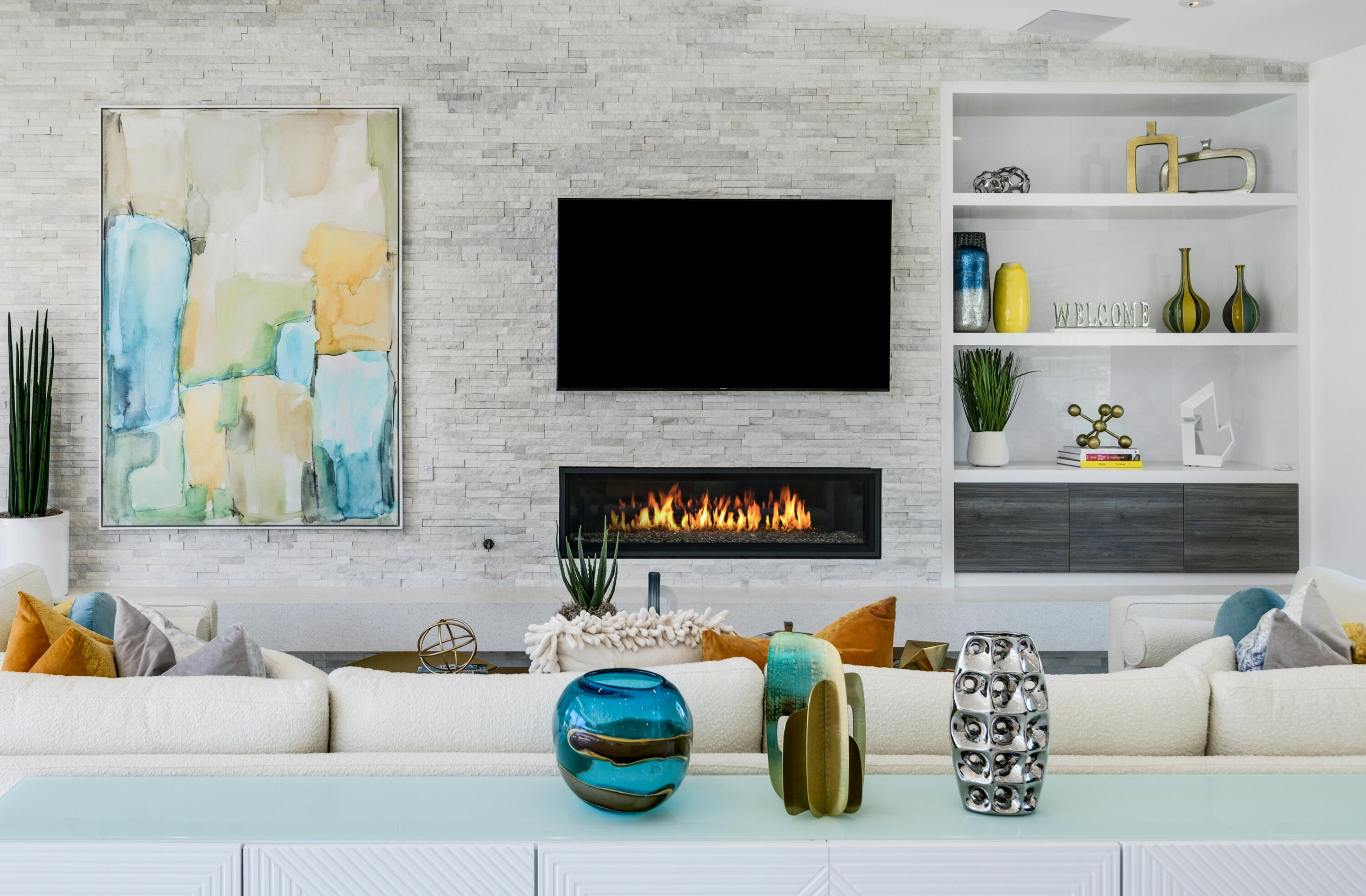 2696 Anza Trail Palm Springs, CA 92264 - Photo 16 of 99 a living room with furniture and a fireplace