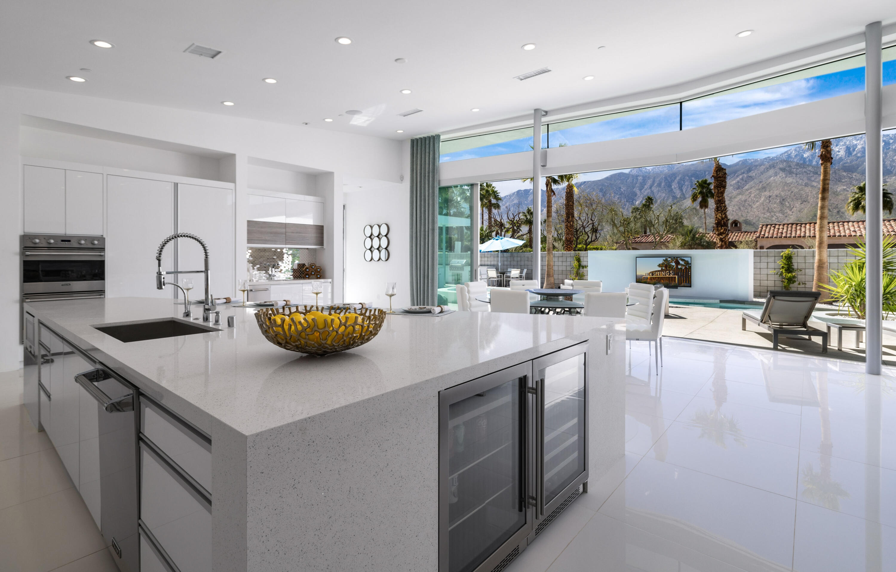 2696 Anza Trail Palm Springs, CA 92264 - Photo 20 of 99 a kitchen with sink cabinets and living room