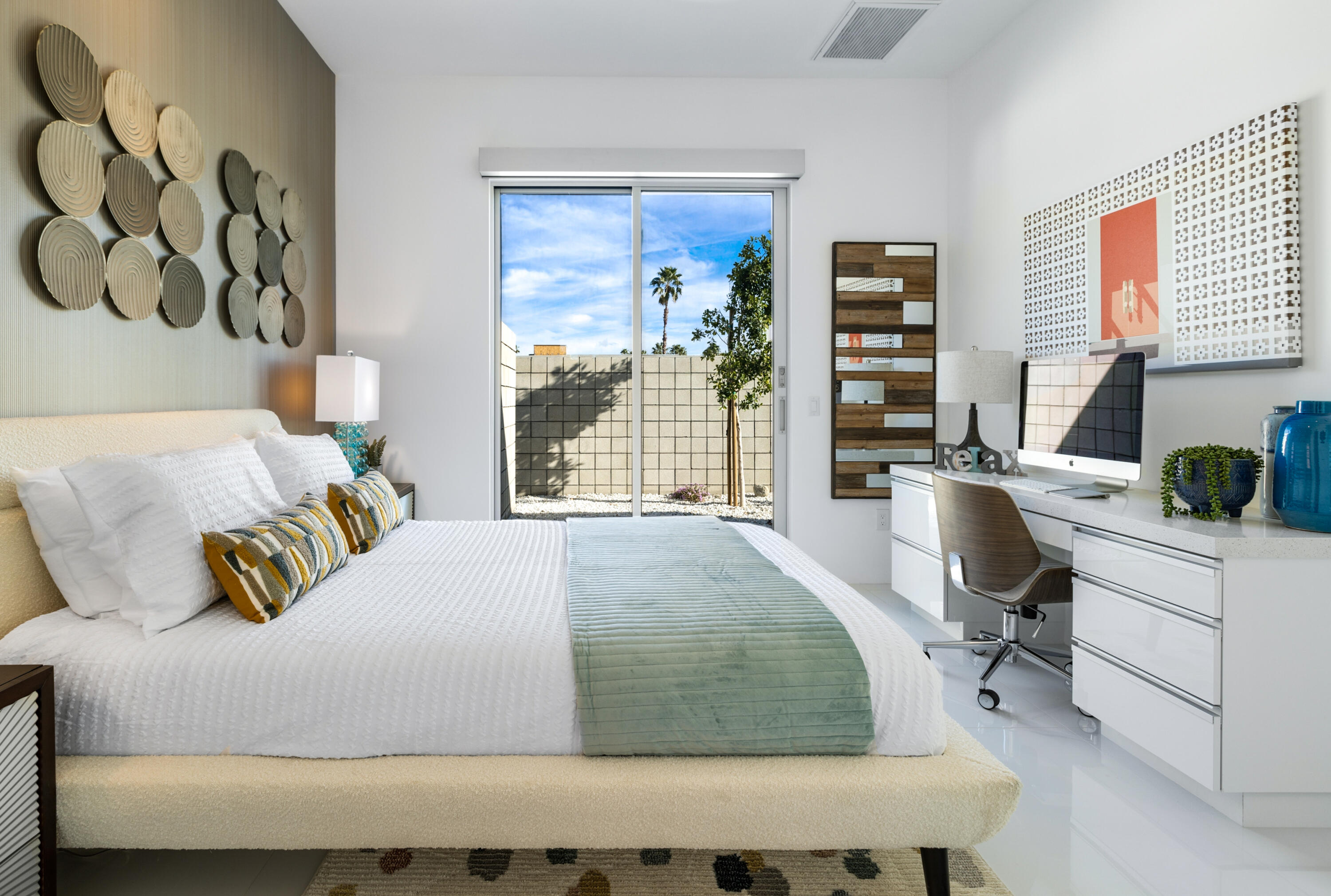 2696 Anza Trail Palm Springs, CA 92264 - Photo 24 of 99 a bedroom with a bed a table and chair