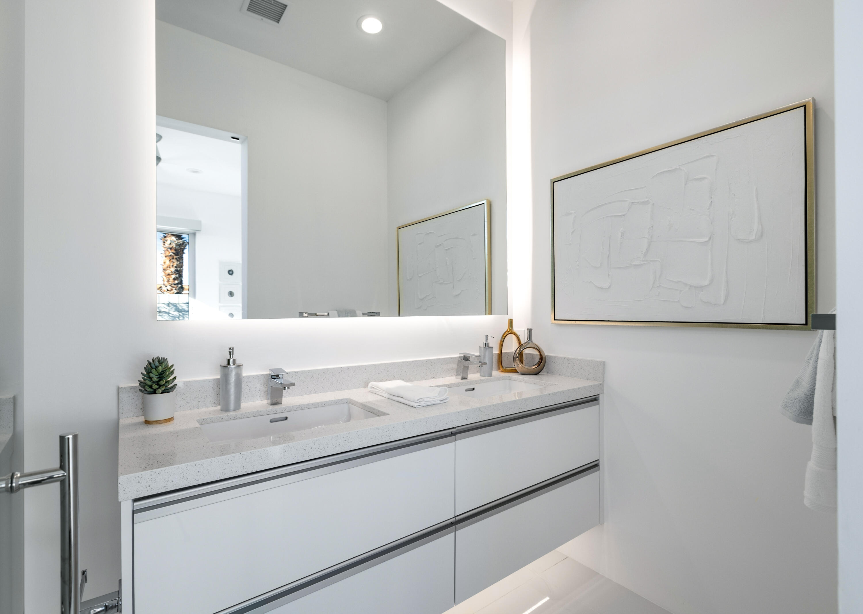2696 Anza Trail Palm Springs, CA 92264 - Photo 28 of 99 a bathroom with a sink and a mirror