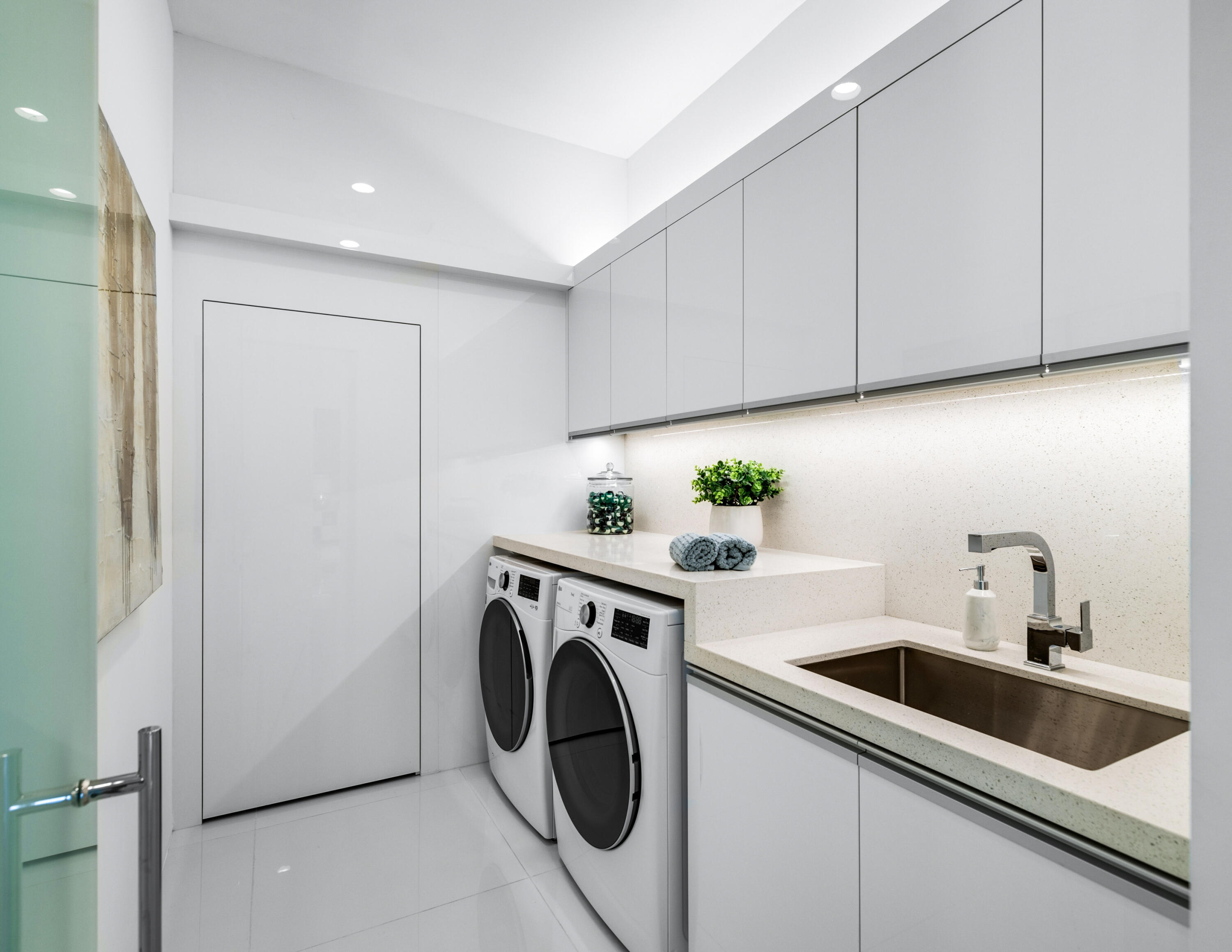 2696 Anza Trail Palm Springs, CA 92264 - Photo 32 of 99 a utility room with sink dryer and washer