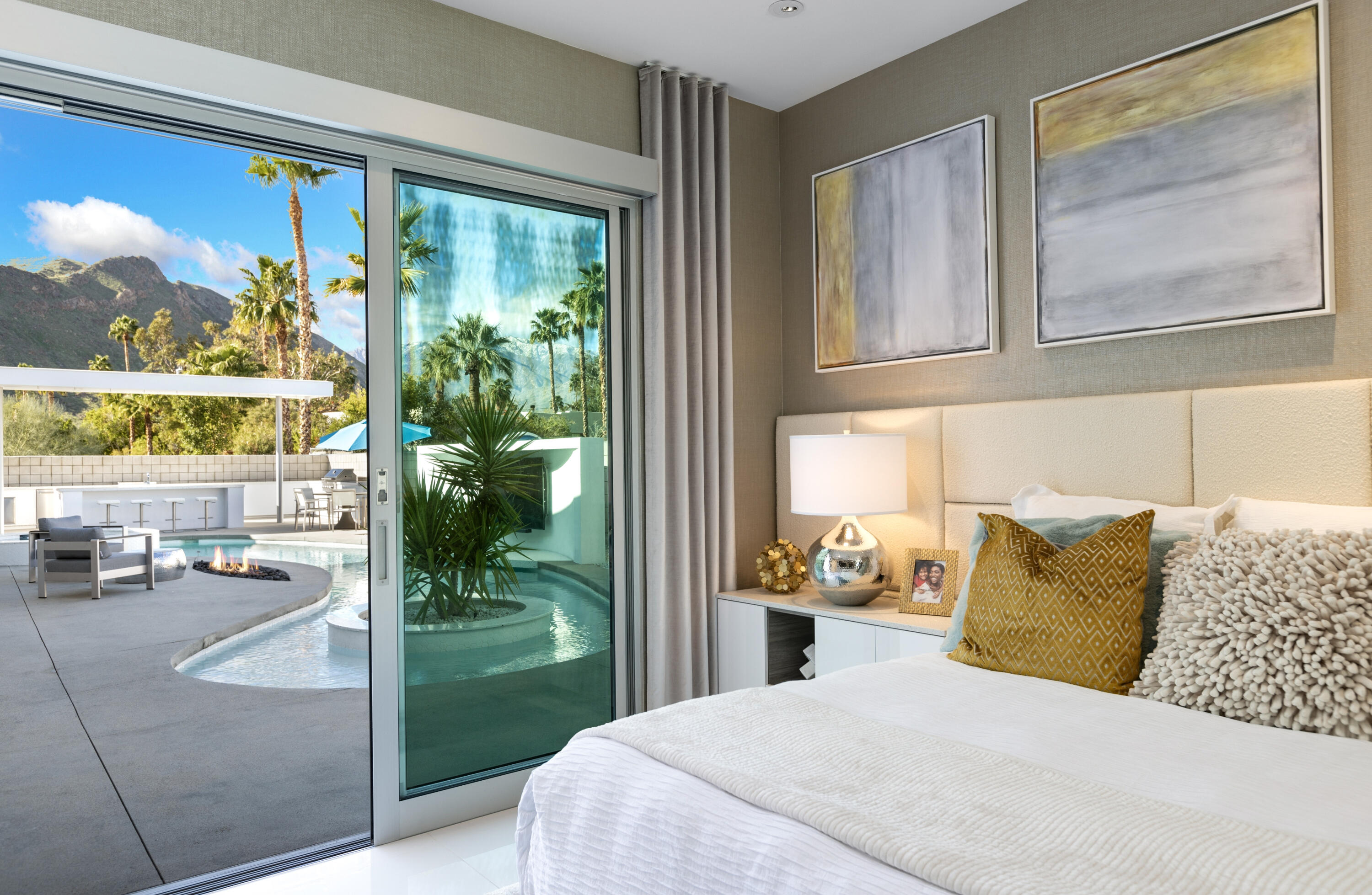 2696 Anza Trail Palm Springs, CA 92264 - Photo 44 of 99 a bedroom with a bed and a window