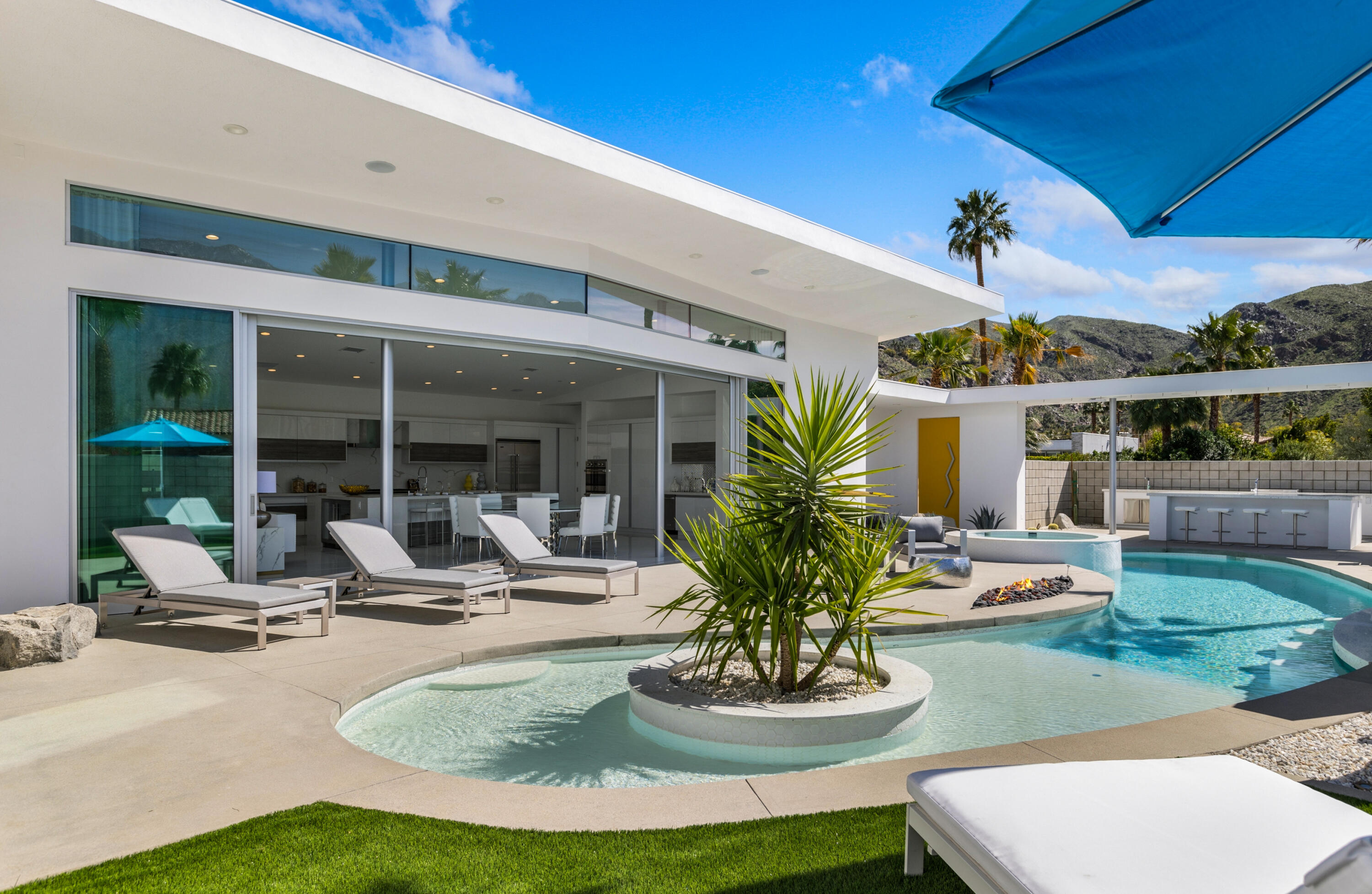 2696 Anza Trail Palm Springs, CA 92264 - Photo 54 of 99 a view of a house with backyard outdoor seating area and furniture