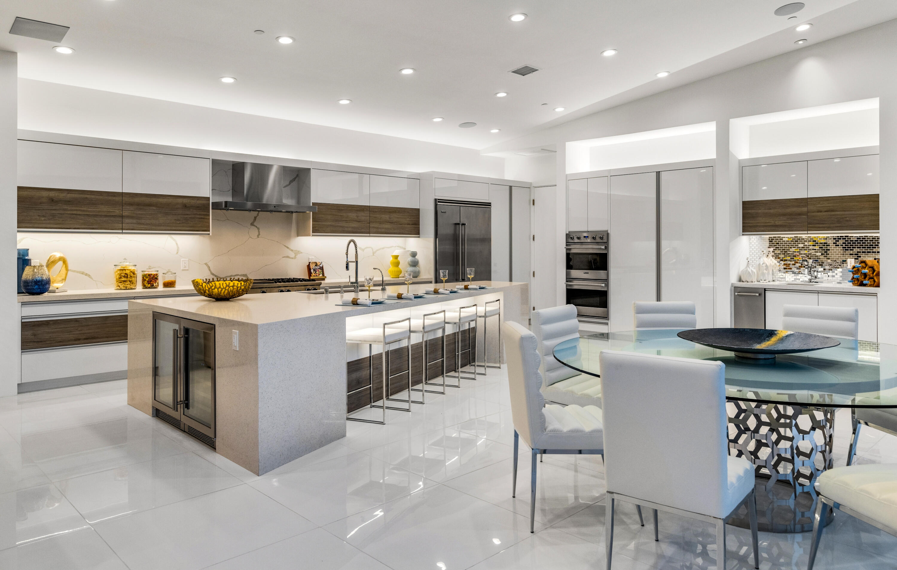 2696 Anza Trail Palm Springs, CA 92264 - Photo 76 of 99 a kitchen with stainless steel appliances kitchen island granite countertop a stove and a sink