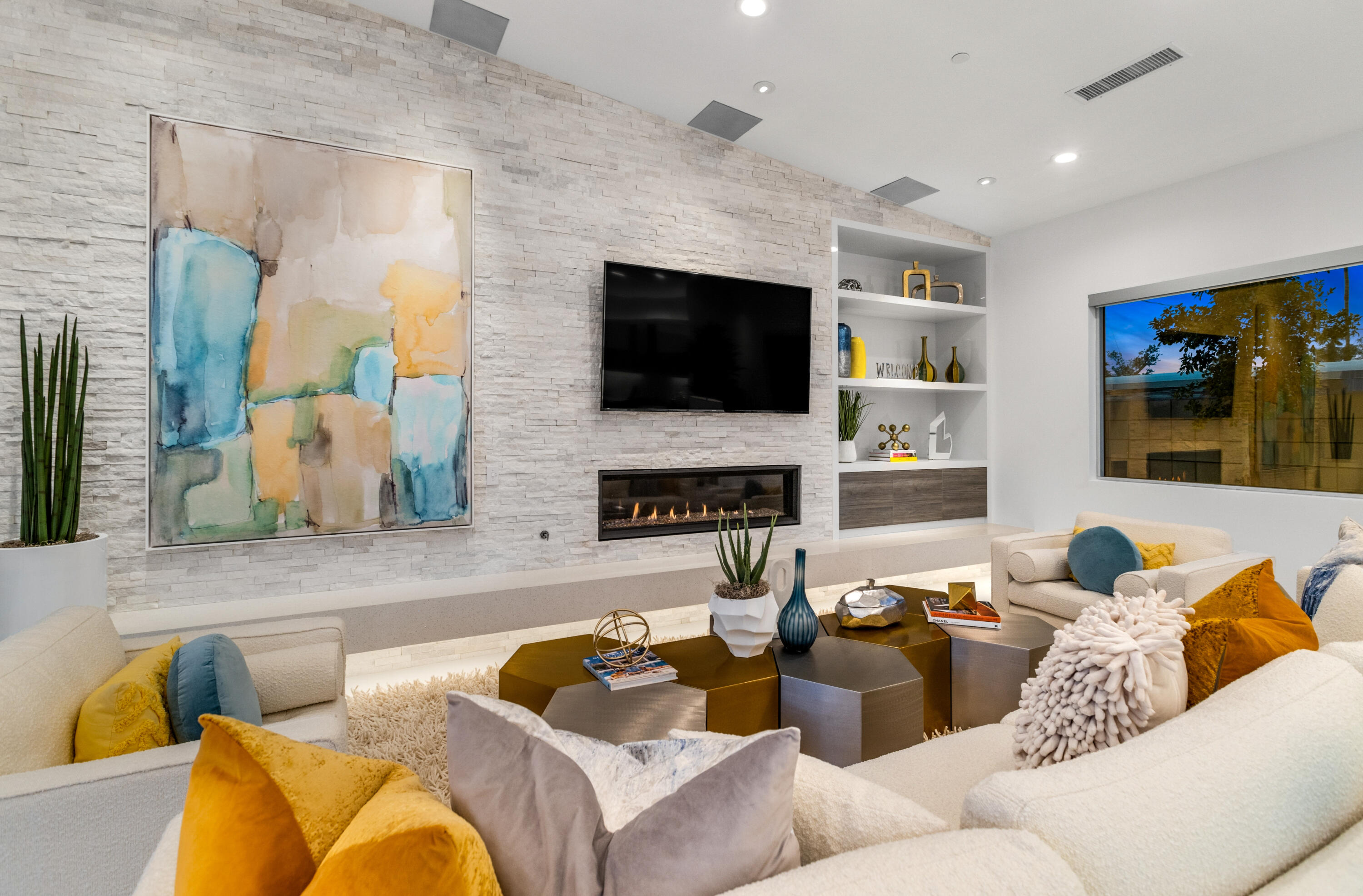 2696 Anza Trail Palm Springs, CA 92264 - Photo 80 of 99 a living room with furniture and a flat screen tv