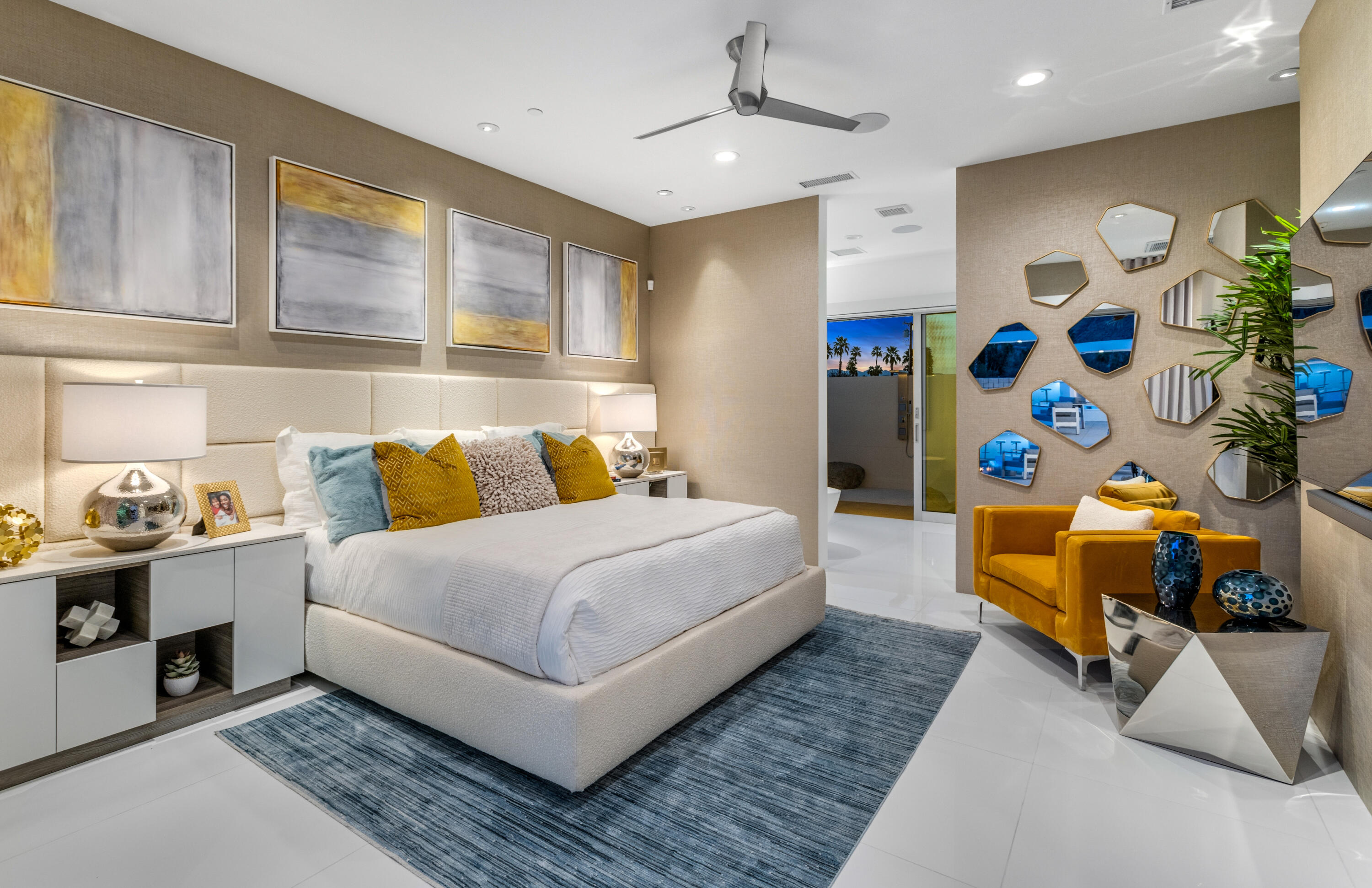 2696 Anza Trail Palm Springs, CA 92264 - Photo 87 of 99 a bedroom with a bed and a couch