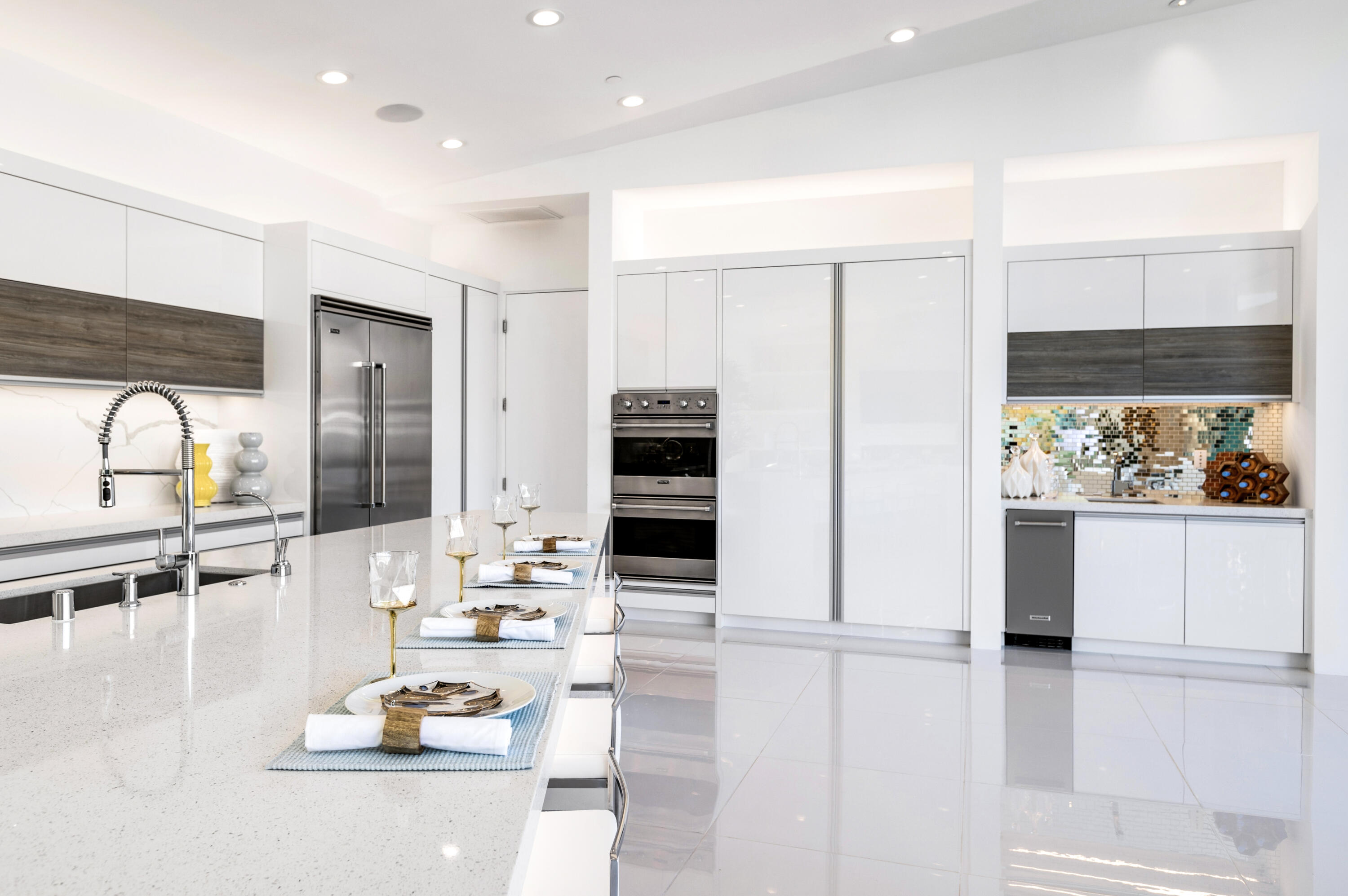 2696 Anza Trail Palm Springs, CA 92264 - Photo 9 of 99 a kitchen with stainless steel appliances kitchen island granite countertop a refrigerator and cabinets