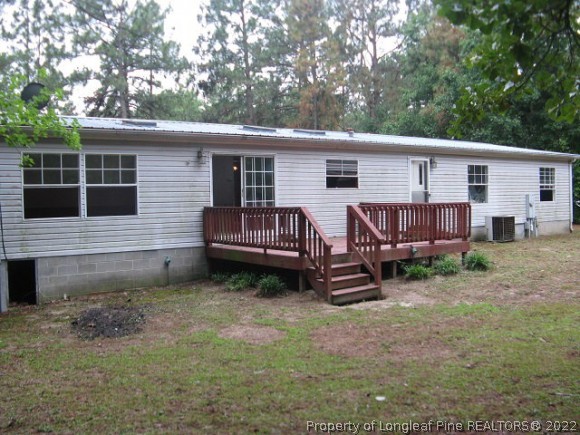 120 Westview Road Carthage, NC 28327 - Photo 2 of 11 a view of a house and a yard in the back