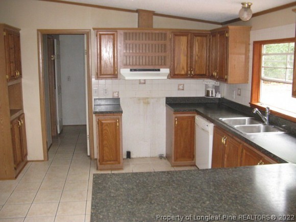 120 Westview Road Carthage, NC 28327 - Photo 8 of 11 a kitchen with stainless steel appliances granite countertop a sink stove and refrigerator