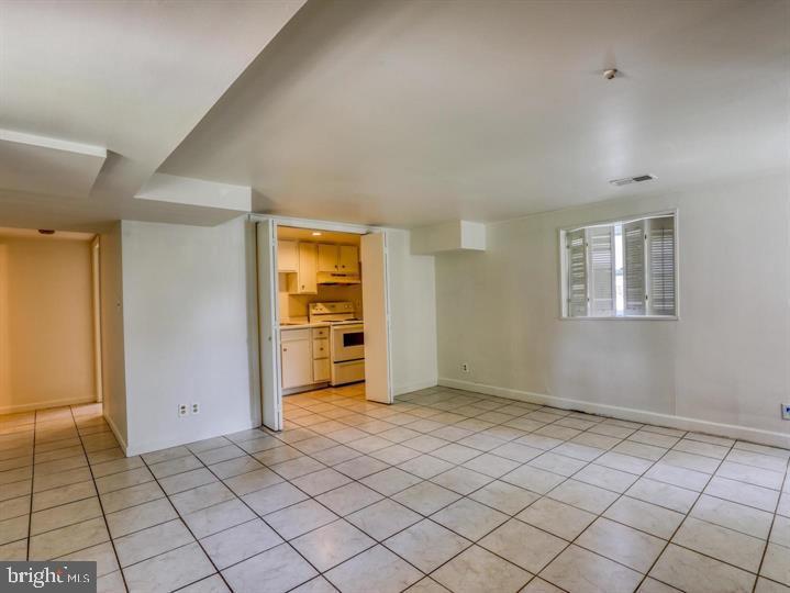 103 North Church Street Berryville, VA 22611 - Photo 3 of 13 a view of an empty room and window