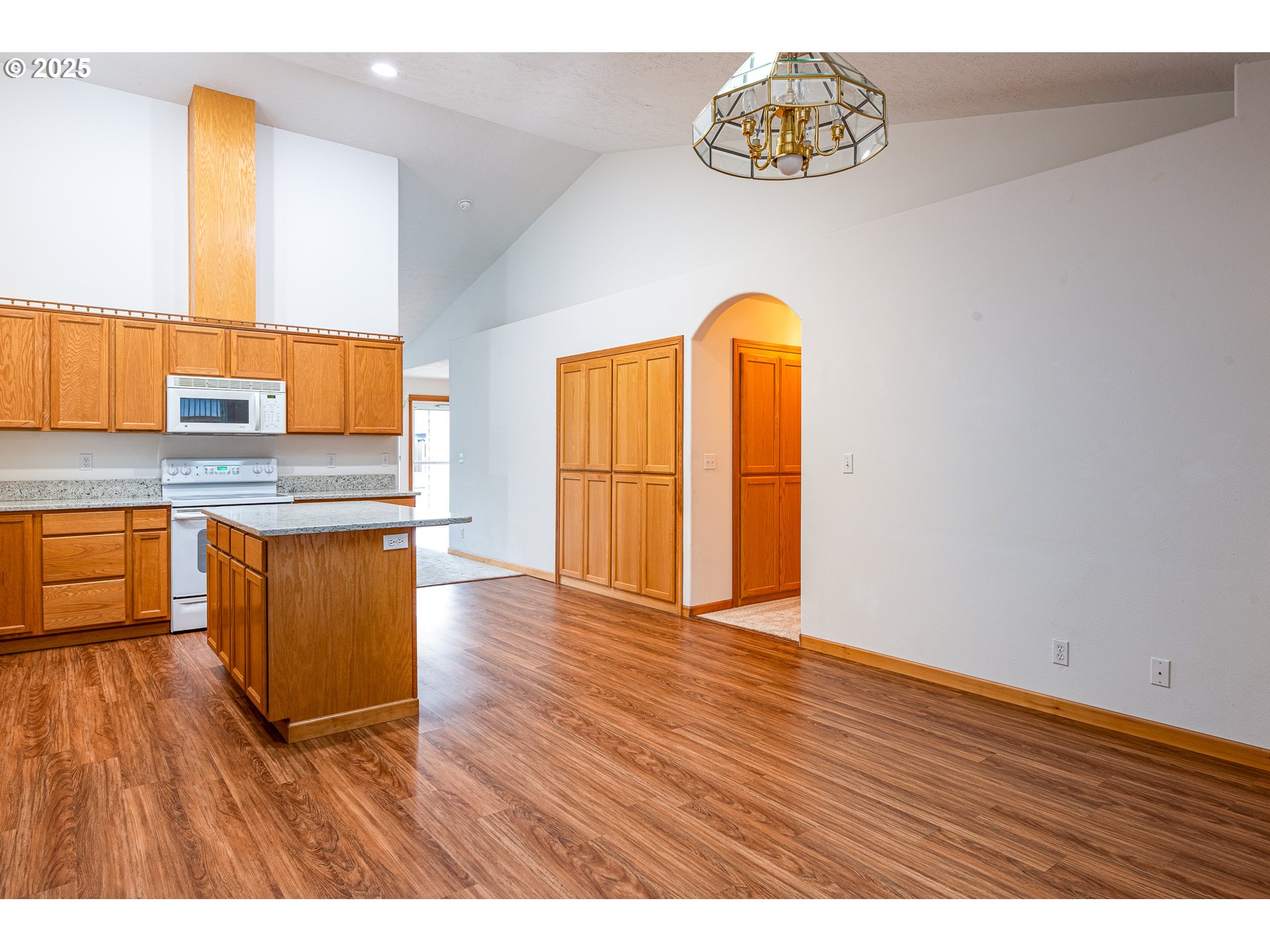 6565 Aaron Lane Springfield, OR 97478 - Photo 22 of 48 a view of kitchen with wooden floor and a sink