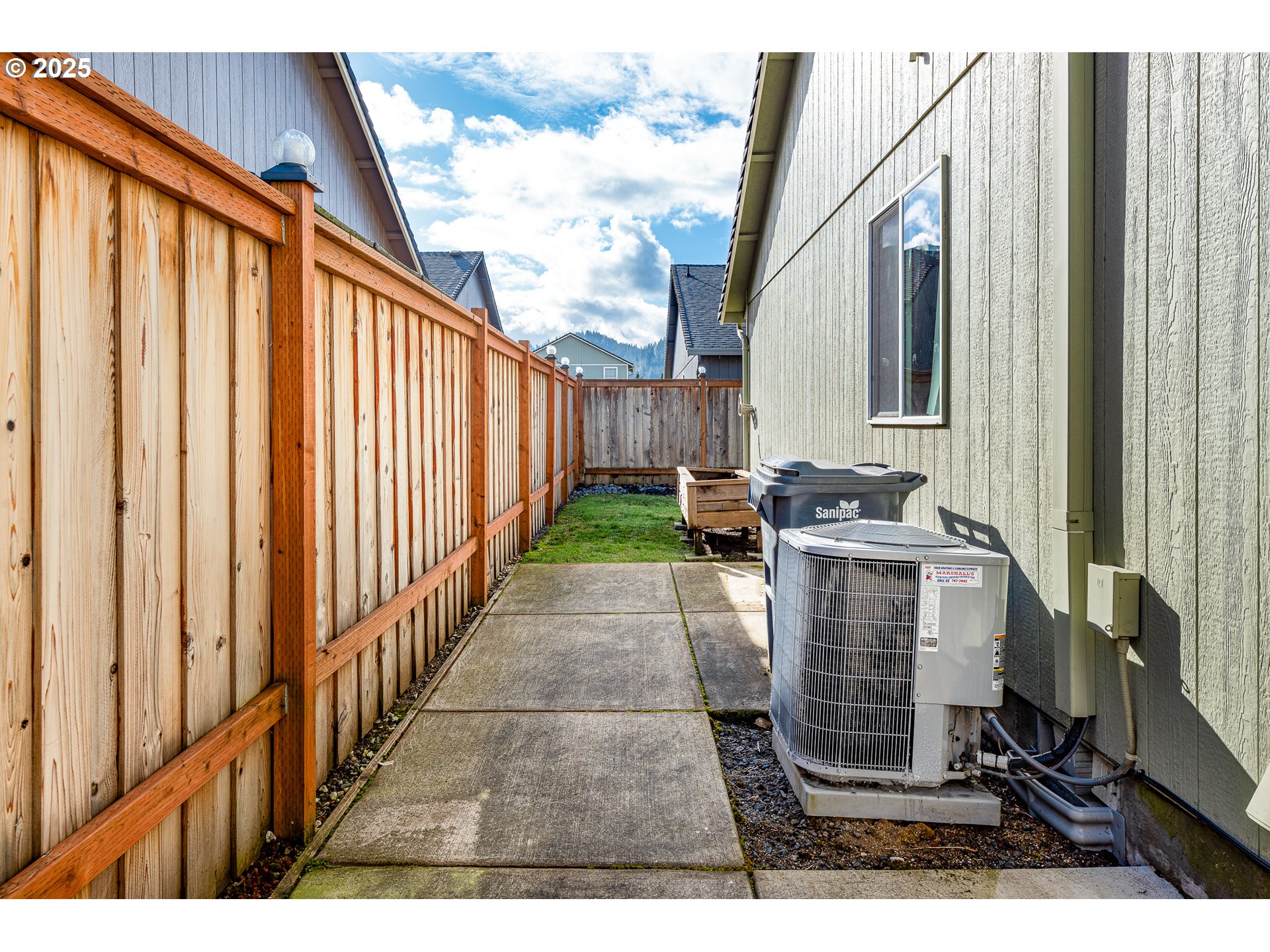 6565 Aaron Lane Springfield, OR 97478 - Photo 41 of 48 a view of a backyard with wooden fence