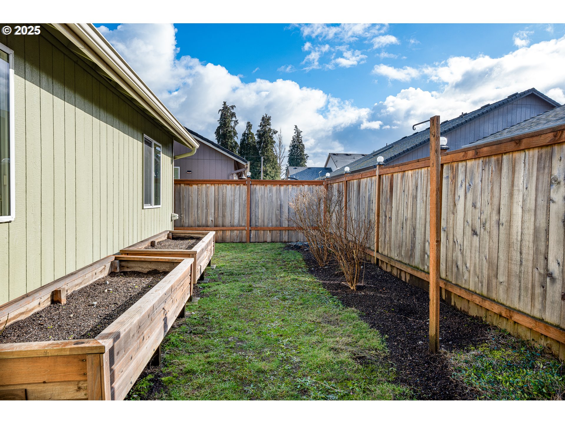 6565 Aaron Lane Springfield, OR 97478 - Photo 47 of 48 a view of a backyard with wooden fence
