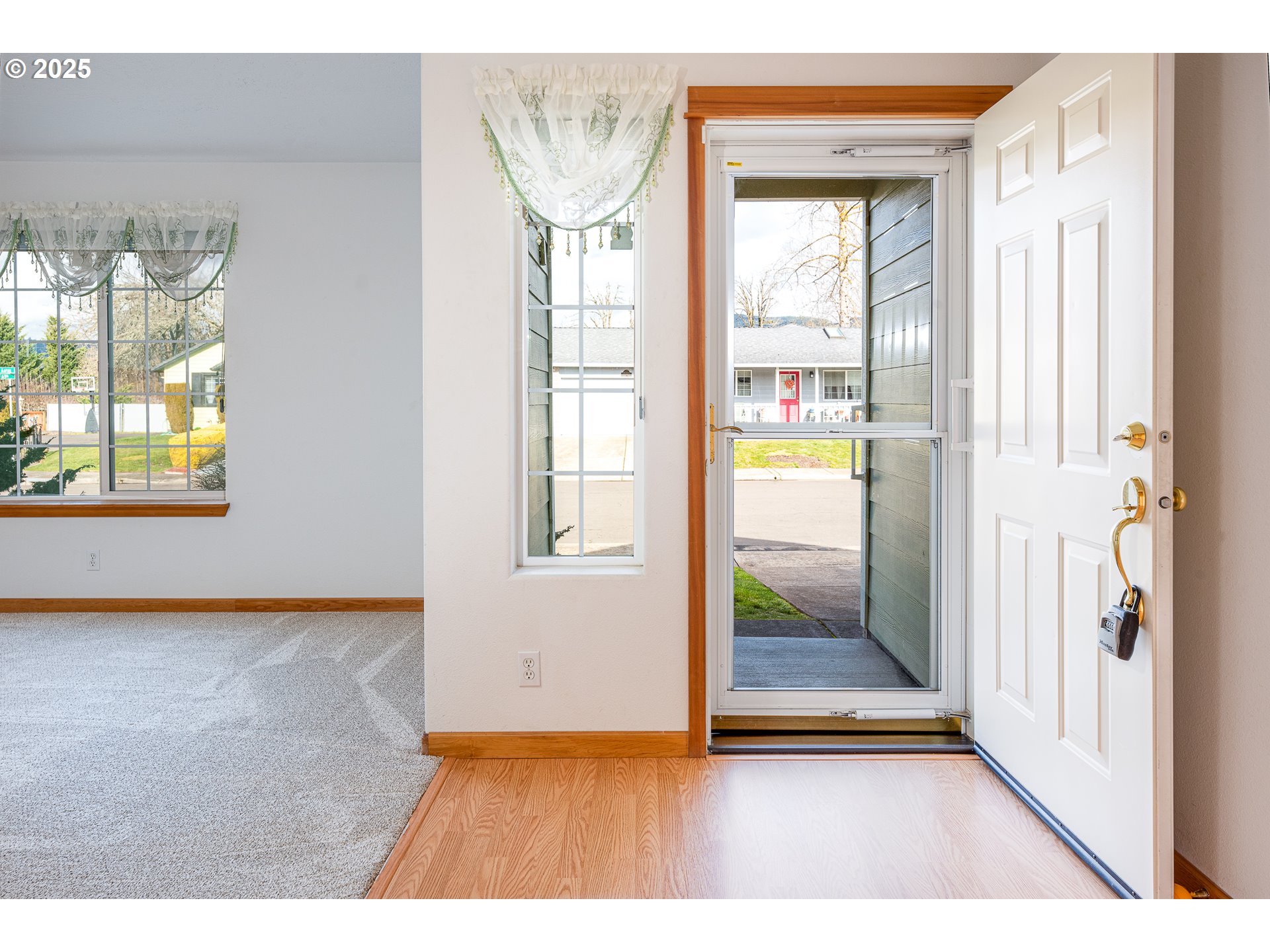 6565 Aaron Lane Springfield, OR 97478 - Photo 7 of 48 a view of an empty room and window