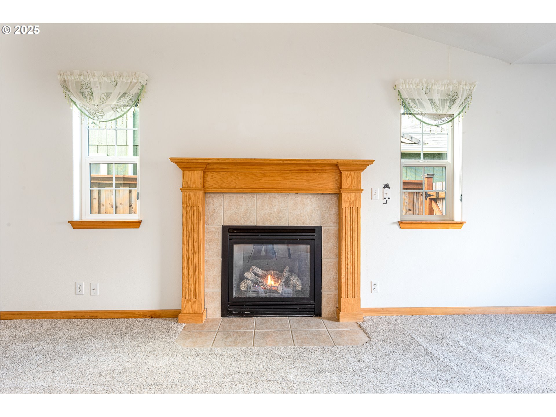 6565 Aaron Lane Springfield, OR 97478 - Photo 10 of 48 a living room with furniture and a fireplace