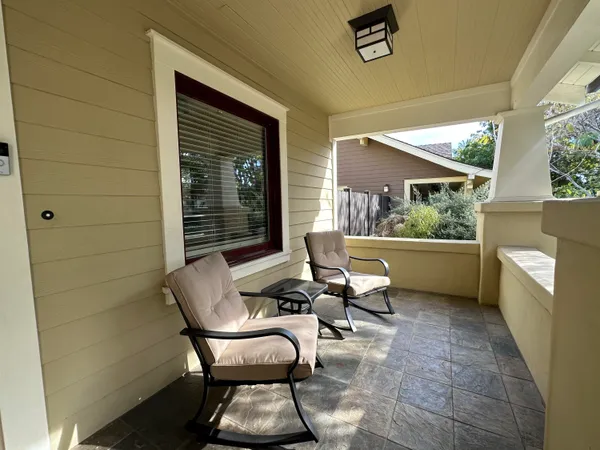 a building outdoor space with patio furniture