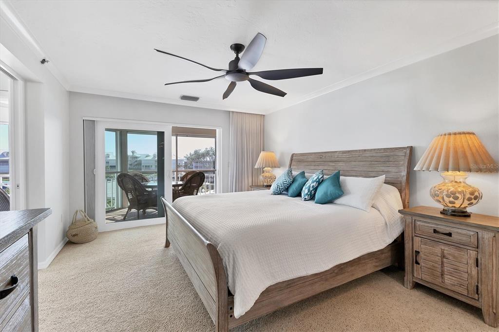 11000 Placida Road, Unit 1603 Placida, FL 33946 - Photo 13 of 44 a bedroom with bed and window