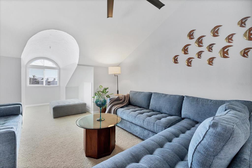11000 Placida Road, Unit 1603 Placida, FL 33946 - Photo 19 of 44 a living room with furniture and white walls