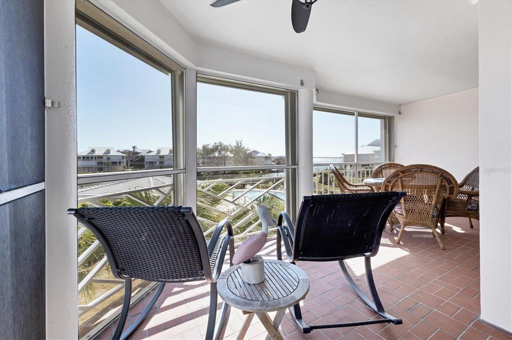 11000 Placida Road, Unit 1603 Placida, FL 33946 - Photo 23 of 44 a living room with furniture and a window