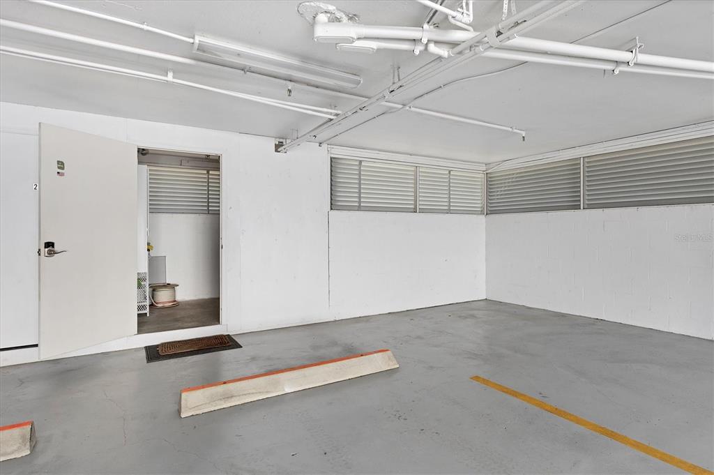 11000 Placida Road, Unit 1603 Placida, FL 33946 - Photo 25 of 34 an empty room with a ceiling fan and wooden floor