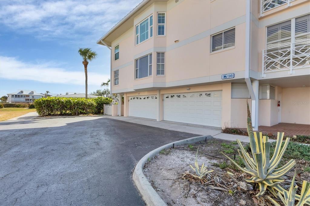 11000 Placida Road, Unit 1603 Placida, FL 33946 - Photo 27 of 44 a view of a backyard with plants