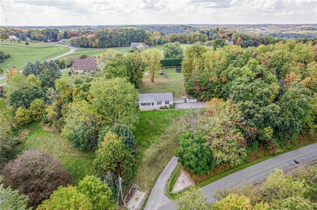 336 Parker Road Sarver, PA 16055 - Photo 2 of 21 a view of a city with lush green forest