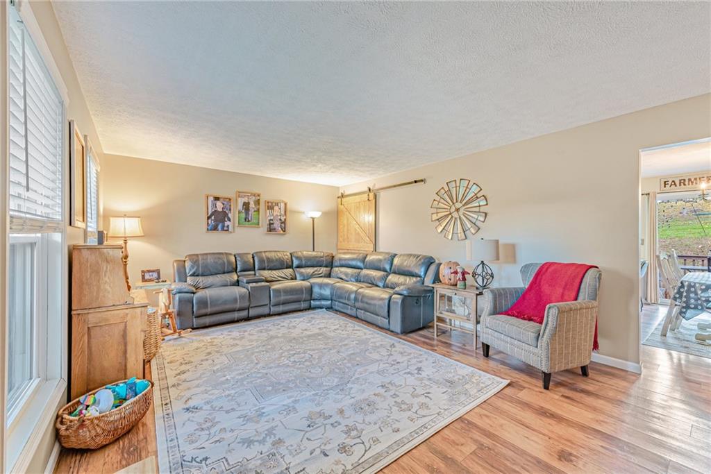336 Parker Road Sarver, PA 16055 - Photo 4 of 21 a living room with furniture and a couch